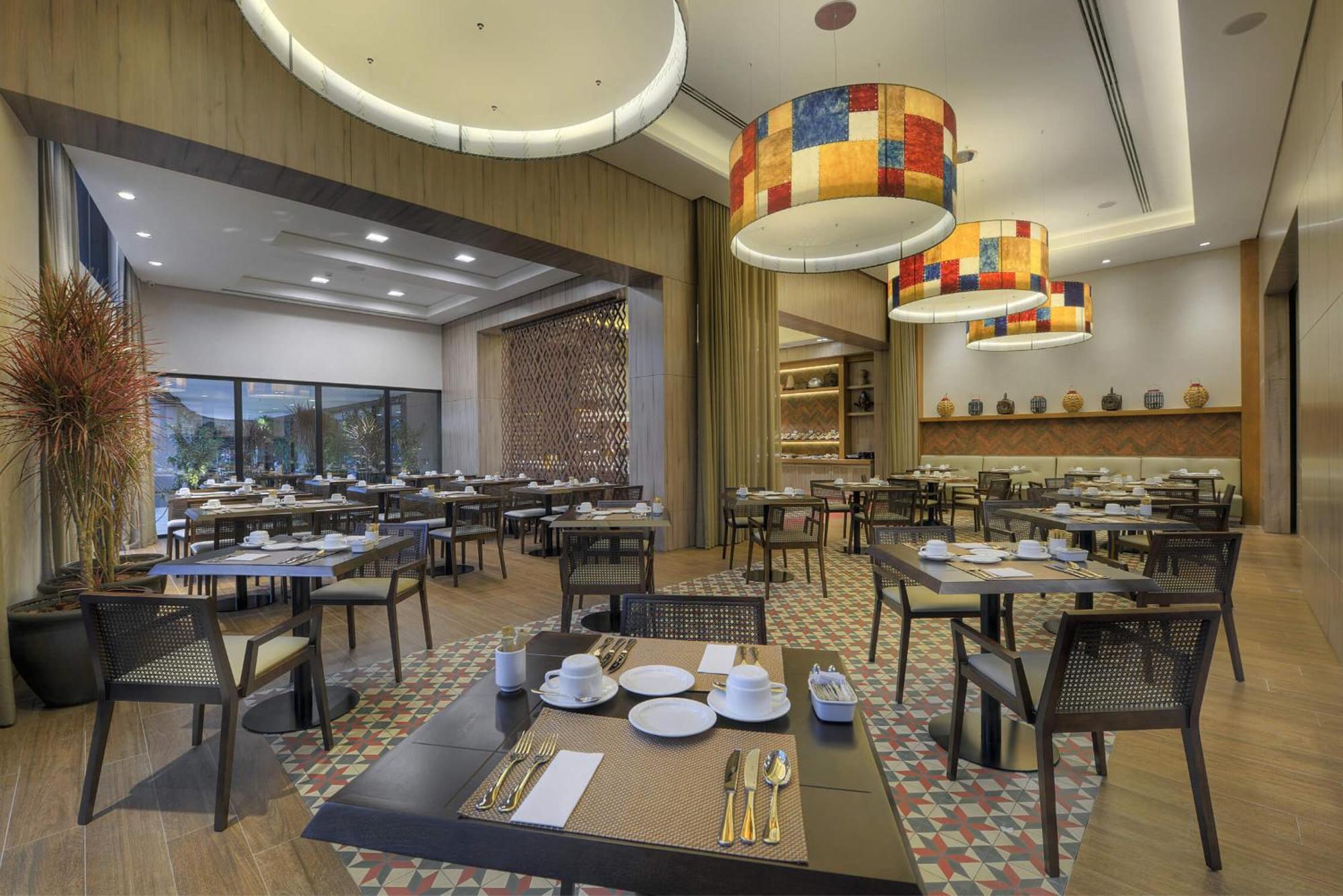 Deville Prime Campo Grande Exterior foto The restaurant